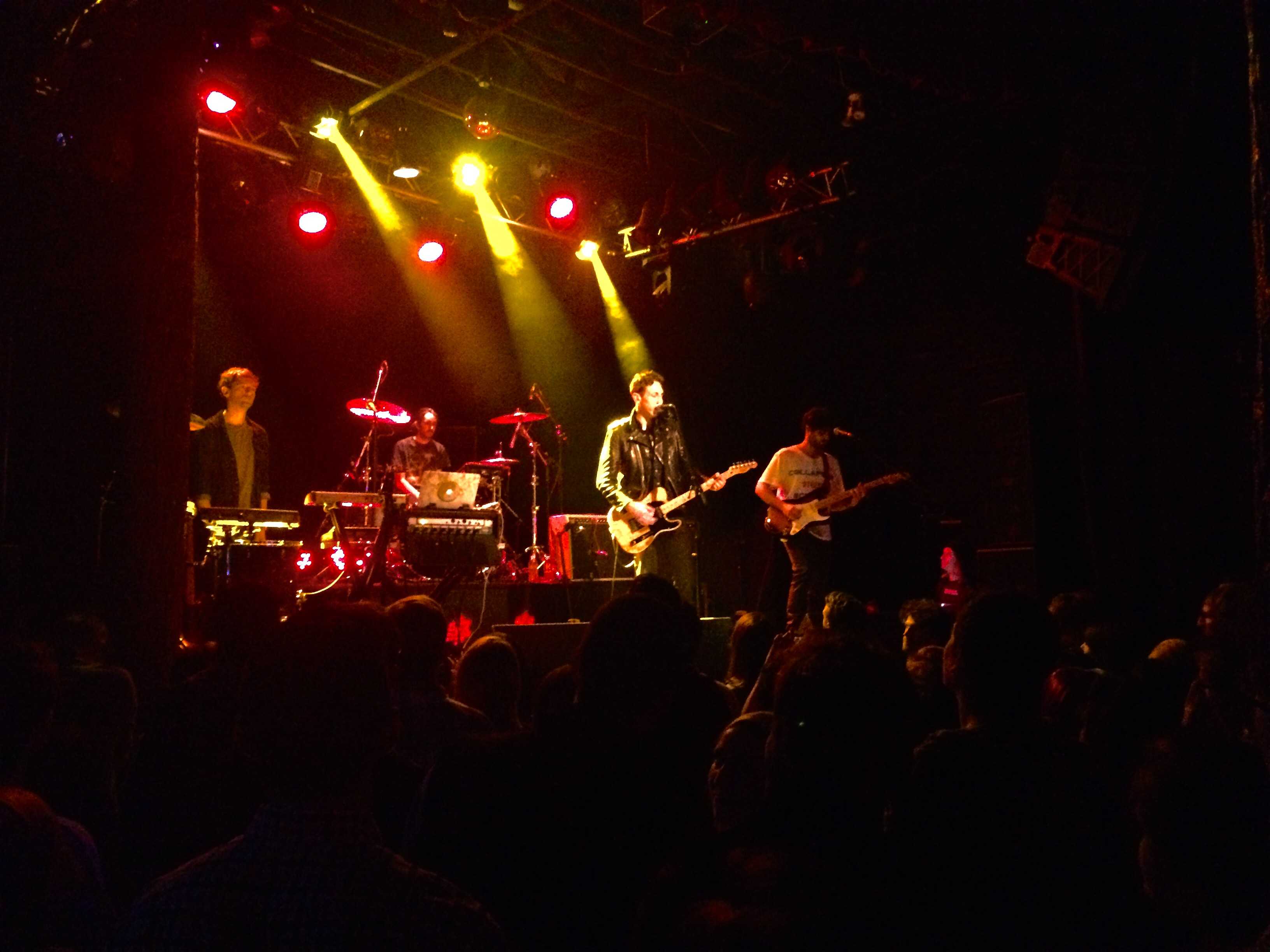 The 4 piece band, lead by Eric Emm (vocals - center) and Jesse Cohen (synth/drums - left) perform for a solid audience at Trees